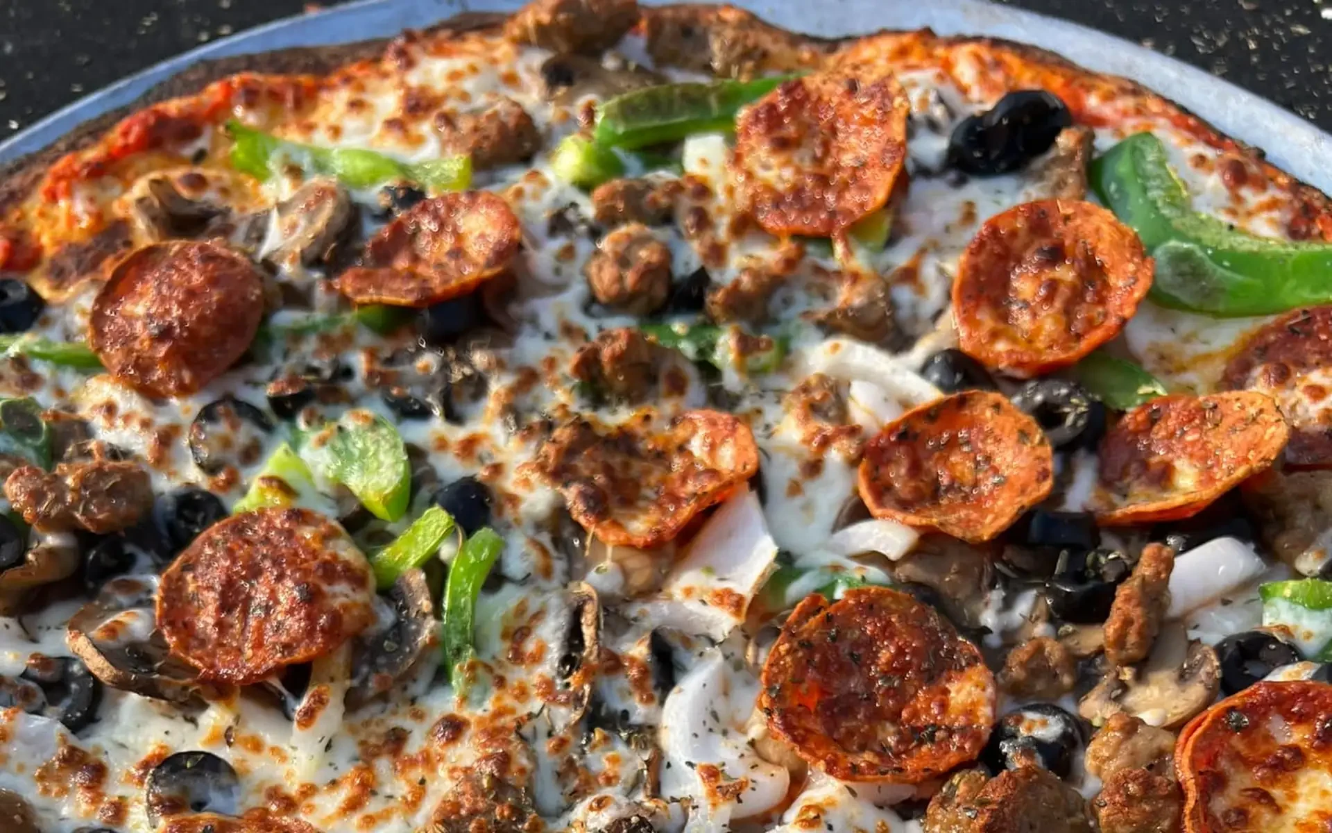 Handcrafted sourdough pizza from The Courtyard Social scratch kitchen in Holiday, FL